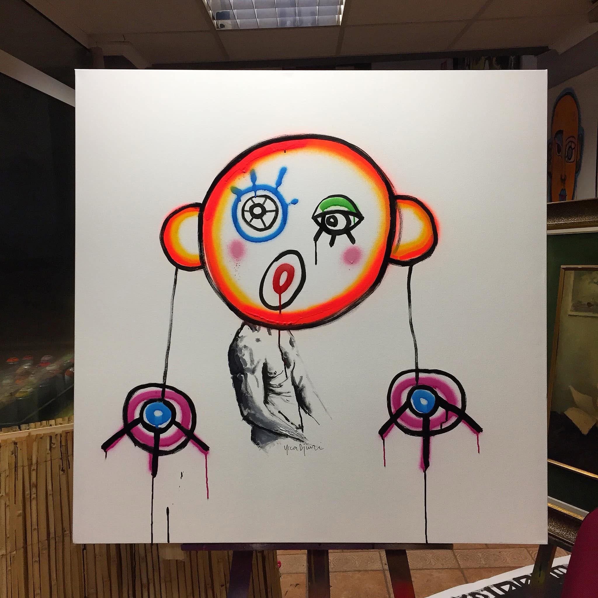 Character with concentric neon eyes on white canvas